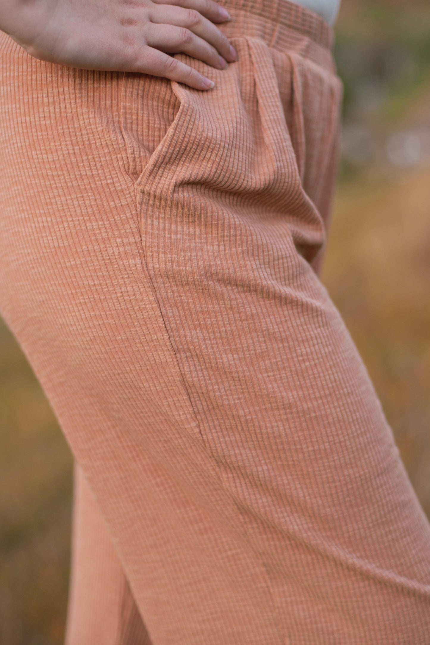 Ribbed salmon pink pants- side