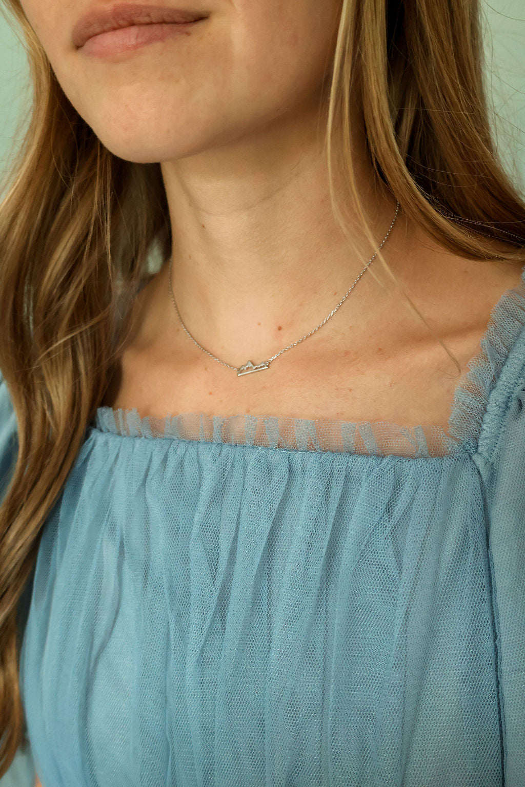 Small silver mountain range necklace