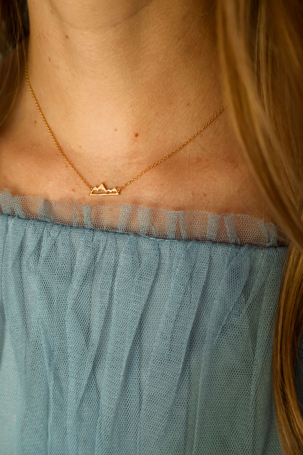 Small gold mountain range necklace